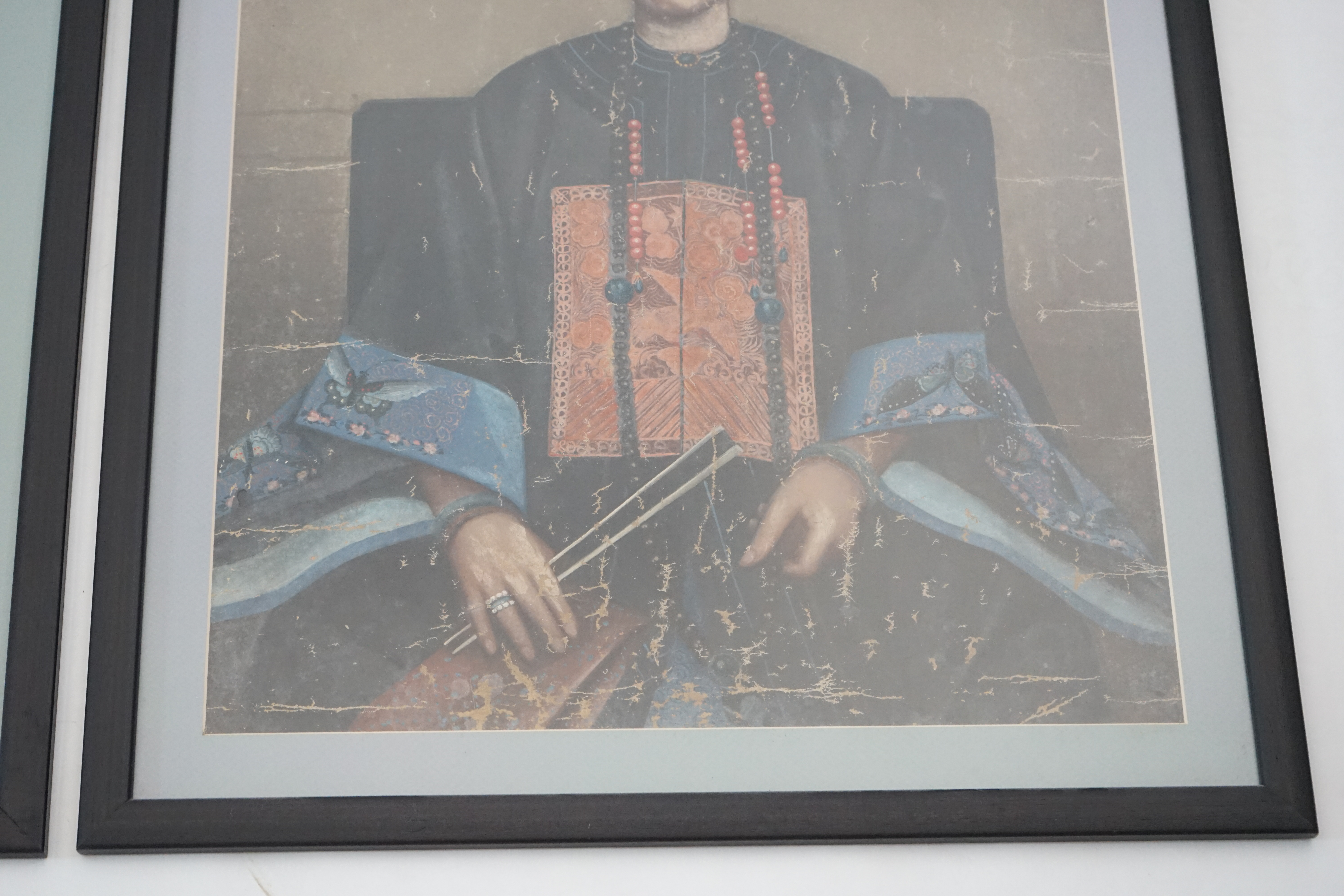 China Trade, late Qing dynasty, two portraits of Qing ladies, oil on canvas, each 63 x 47cm, later framed and glazed. Condition - poor to fair
